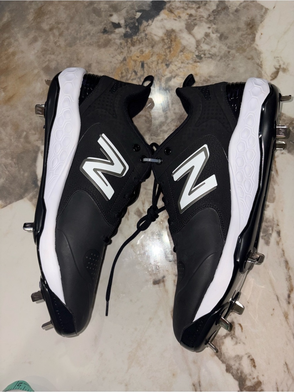 New Balance Men’s Black and White Baseball Cleats with Metal Spikes